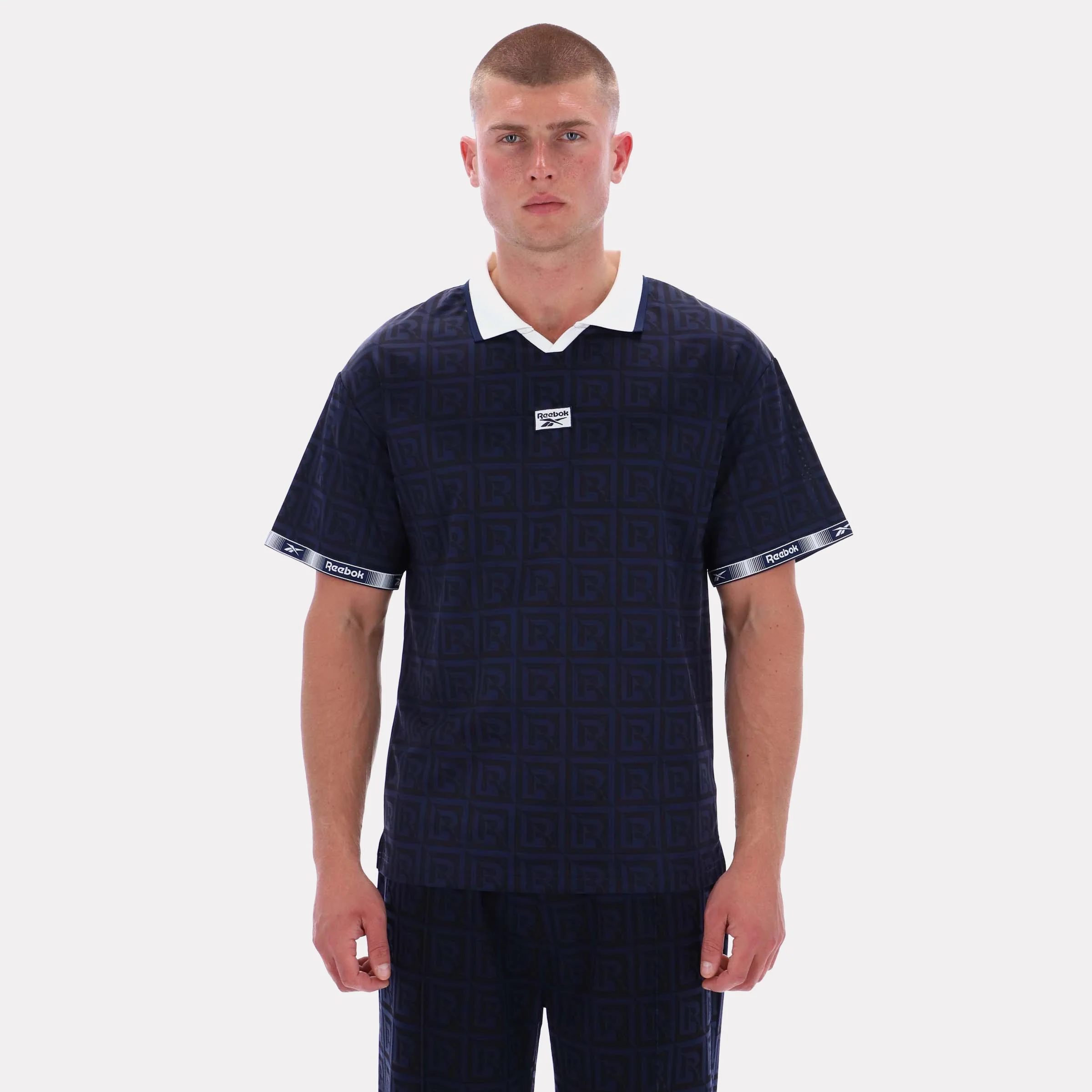 Reebok Apparel Men Reebok Monogram Graphic Jersey VECTOR NAVY AOP