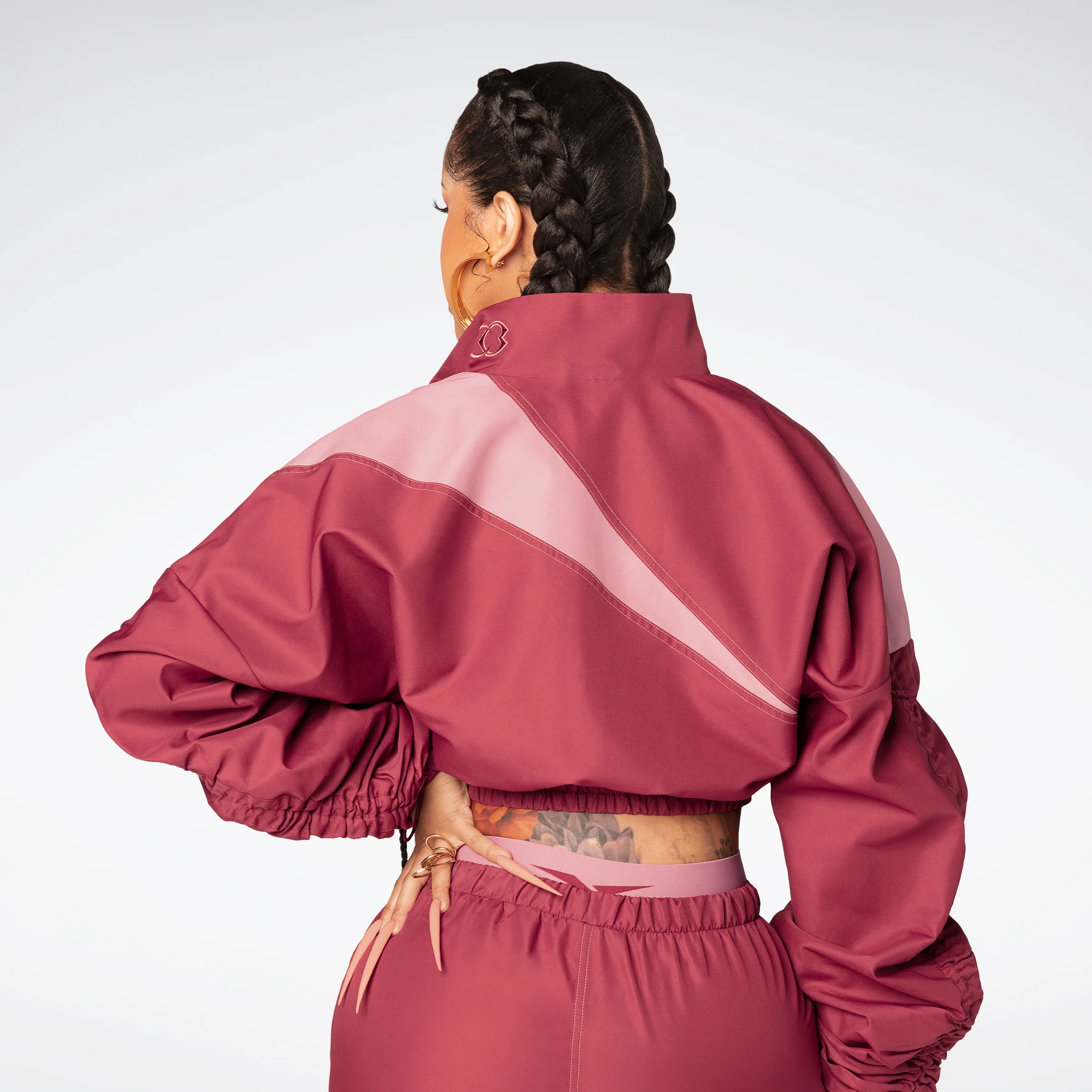Reebok Apparel Women Cardi B Woven Satin Track Top Trired - Image 3