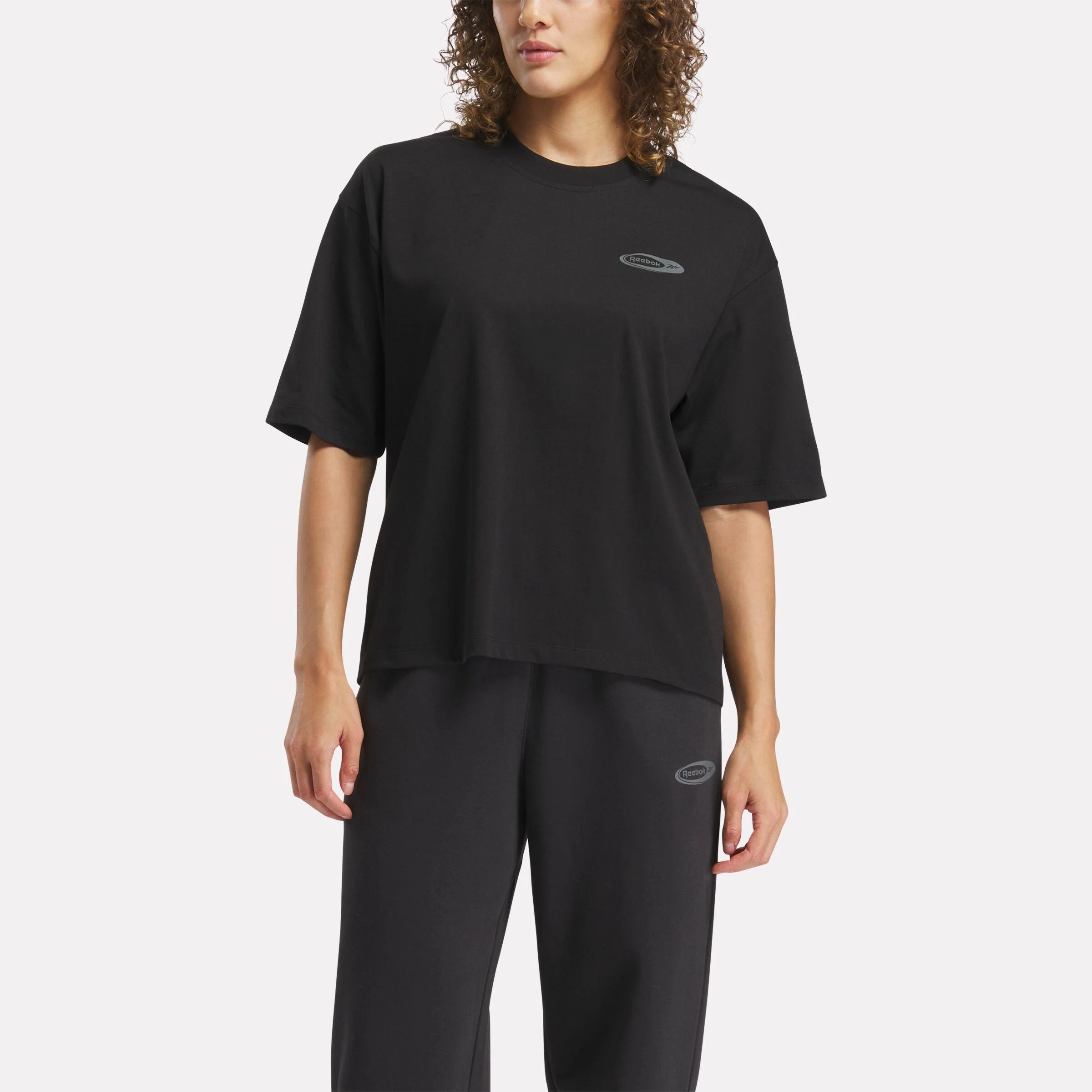 Reebok Apparel Women ID Energy Brand Proud T-Shirt BLACK