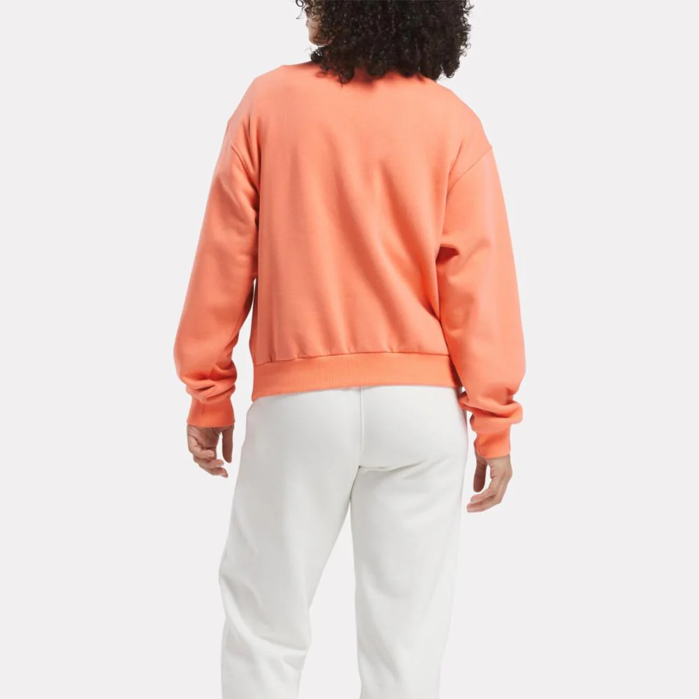 Reebok Apparel Women ID Energy Fleece Midlayer Top SUPERCHARGED CORAL - Image 3