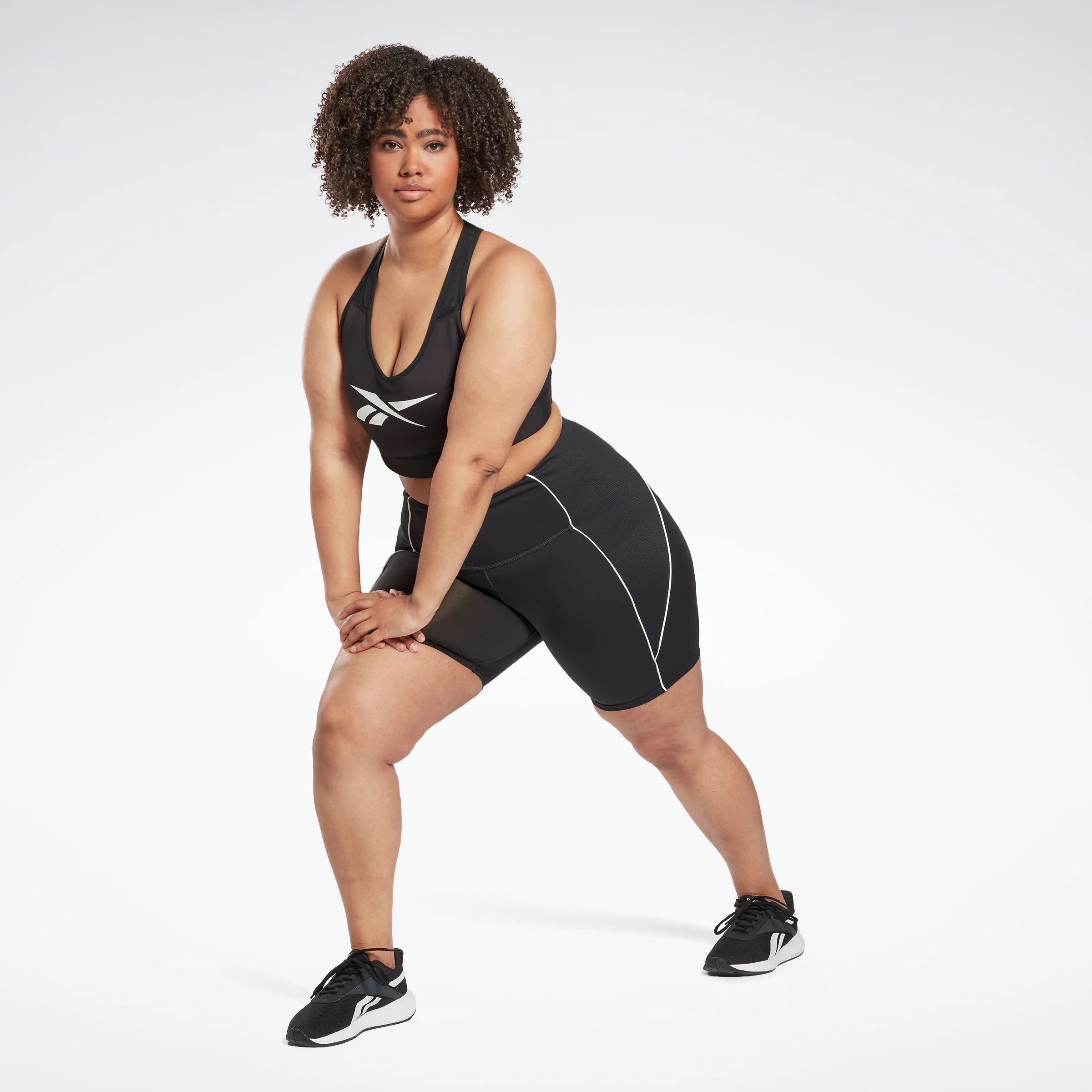Reebok Apparel Women Workout Ready Poly Shorts (Plus Size) Nghblk - Image 2
